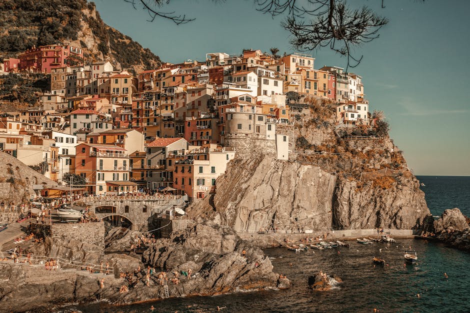 Charming colorful town on rugged cliffs by the sea in Cinque Terre, Italy.