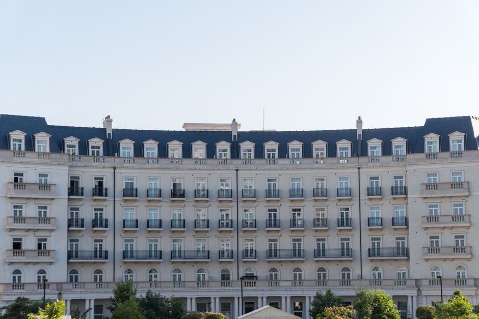 Facade of a classic building in Baku's White City, showcasing elegant architecture.